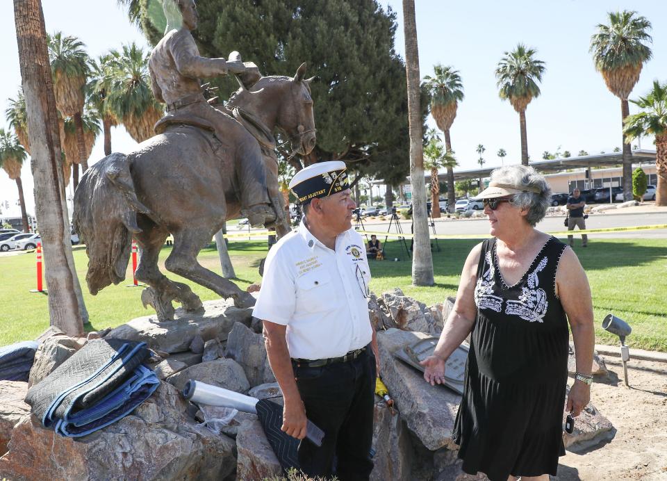 Amado Salinas II talks with Negie Bogert while protesting the removal of the Frank Bogert statue at Palm Springs City Hall on May 17.