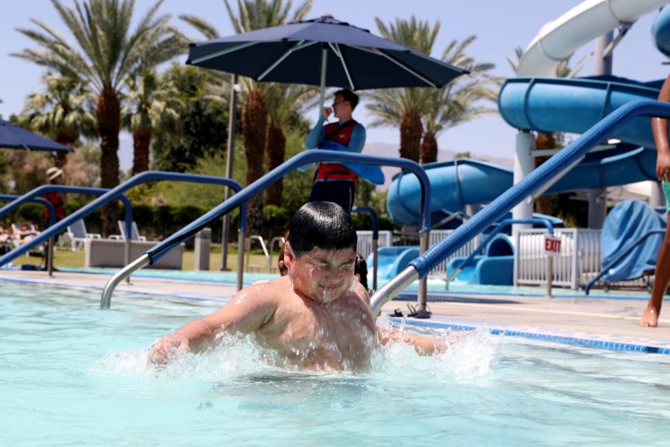 Erik Benitez, 6, of Coachella plays in the pool at Palm Desert Aquatics Center in Palm Desert, Calif., on Thursday, June 29, 2023. 