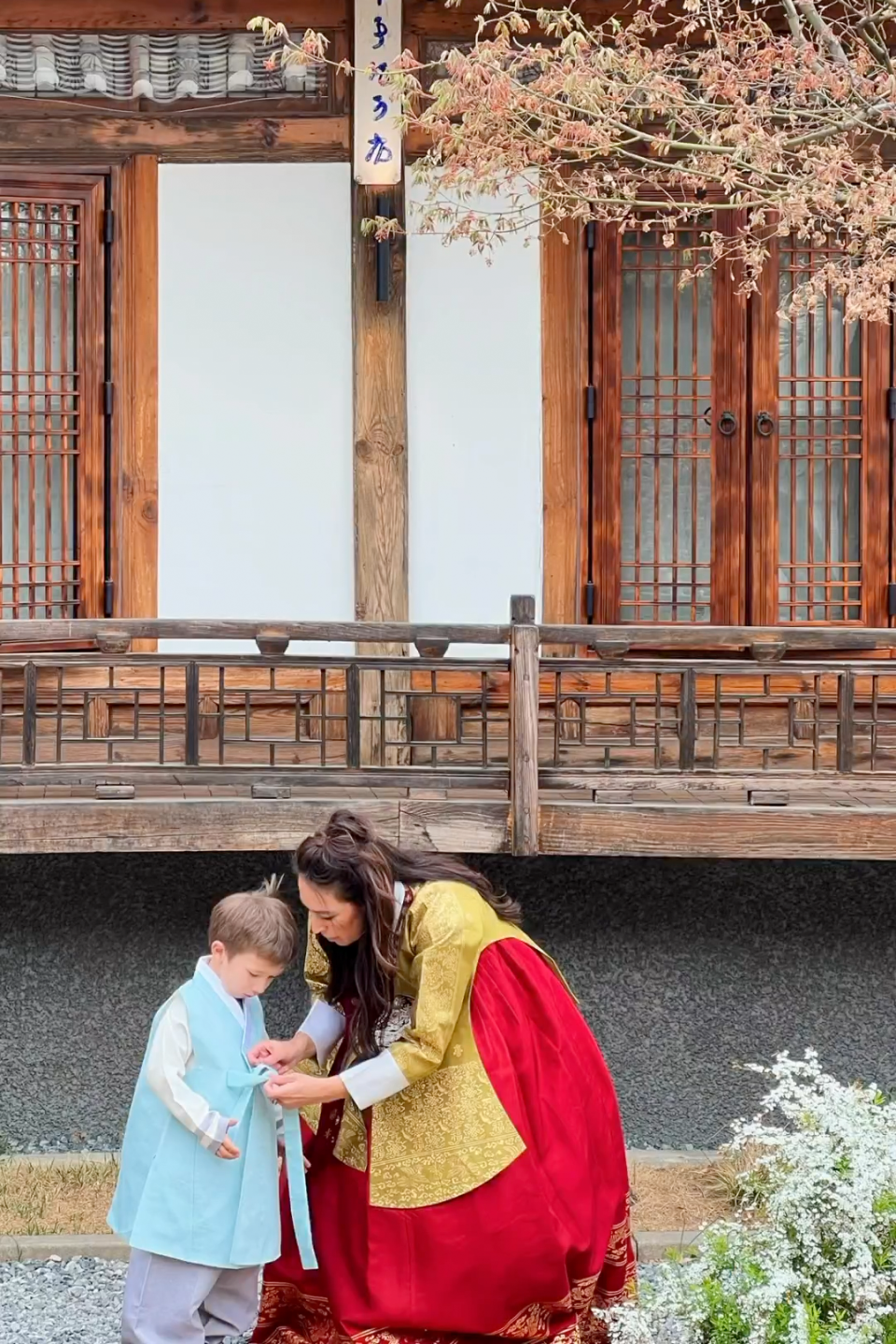 Joanna Gaines helps her son Crew dress in his traditional Korean garb. (Joanna Gaines via Instagram)