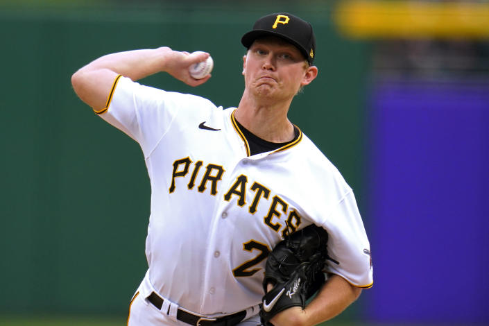 Pittsburgh Pirates starting pitcher Mitch Keller delivers in the first inning of a baseball game against the Cincinnati Reds in Pittsburgh, Sunday, Oct. 3, 2021. (AP Photo/Gene J. Puskar)
