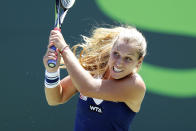 Dominika Cibulkova, of Slovakia, returns to Agnieszka Radwanska, of Poland, at the Sony Open Tennis tournament in Key Biscayne, Fla., Wednesday, March 26, 2014. (AP Photo/Joel Auerbach)