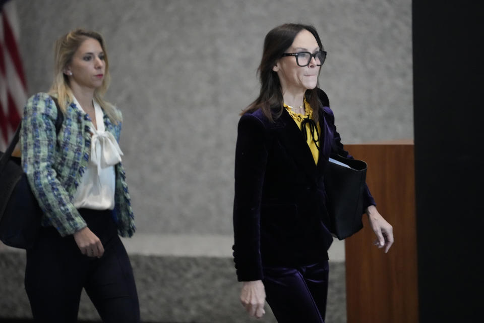 Attorneys for R. Kelly, Jennifer Bonjean, right, and Ashley Cohen arrive at the Dirksen Federal Building for Kelly's sentencing hearing Thursday, Feb. 23, 2023, in Chicago. (AP Photo/Charles Rex Arbogast)