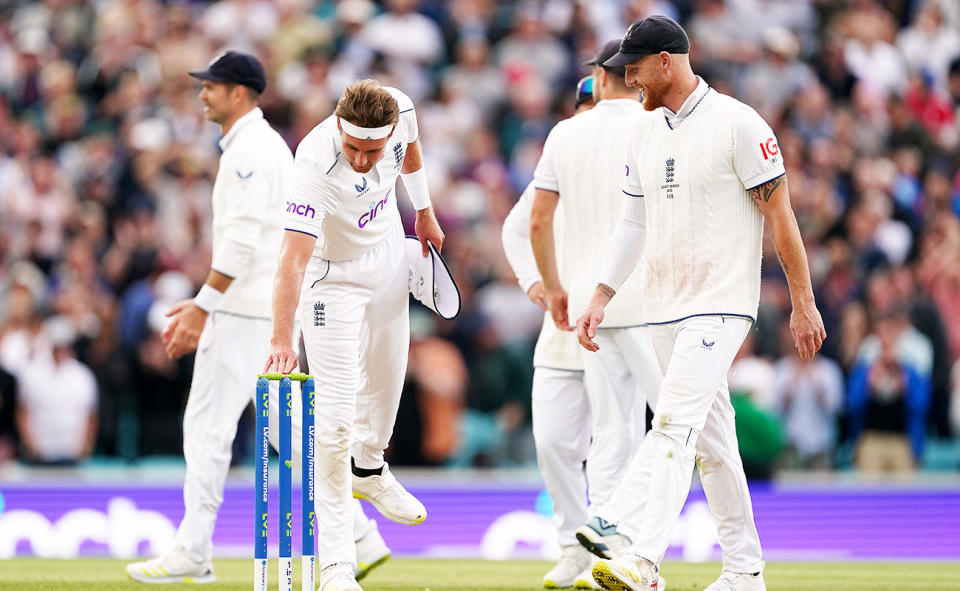 Stuart Broad touches the bails during the fifth Ashes Test.