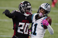 Carolina Panthers wide receiver Robby Anderson (11) makes the catch against Atlanta Falcons defensive back Kendall Sheffield (20) during the first half of an NFL football game, Sunday, Oct. 11, 2020, in Atlanta. (AP Photo/John Bazemore)