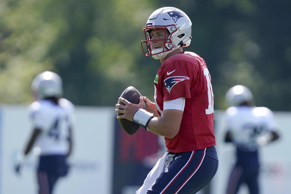 New England Patriots quarterback Mac Jones warms up during an NFL football joint practice with the Carolina Panthers, Tuesday, Aug. 16, 2022, in Foxborough, Mass. (AP Photo/Steven Senne)