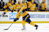 FILE - In this May 21, 2021, file photo, Nashville Predators defenseman Ryan Ellis shoots during the second period in Game 3 of an NHL hockey Stanley Cup first-round playoff series against the against the Carolina Hurricanes in Nashville, Tenn. The Philadelphia Flyers finally landed a premier defenseman when the acquired Ryan Ellis in a trade with Nashville. The Flyers think he can regain the form that made him one of the NHL's best defenseman — a position of need for the team for a while. (AP Photo/Mark Humphrey, File)