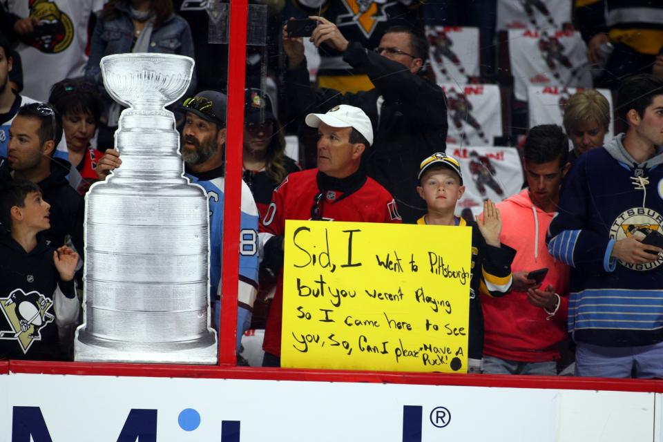 <p>A young Penguins fan with a sign for Pittsburgh Penguins Center Sidney Crosby (87) before the start of Game 4 of the Eastern Conference Finals of the 2017 NHL Stanley Cup Playoffs between the Pittsburgh Penguins and Ottawa Senators on May 19, 2017, at Canadian Tire Centre in Ottawa, On.(Photo by Jason Kopinski/Icon Sportswire via Getty Images) </p>