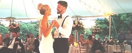 Chelsea and Timothy Dix dancing at wedding reception.