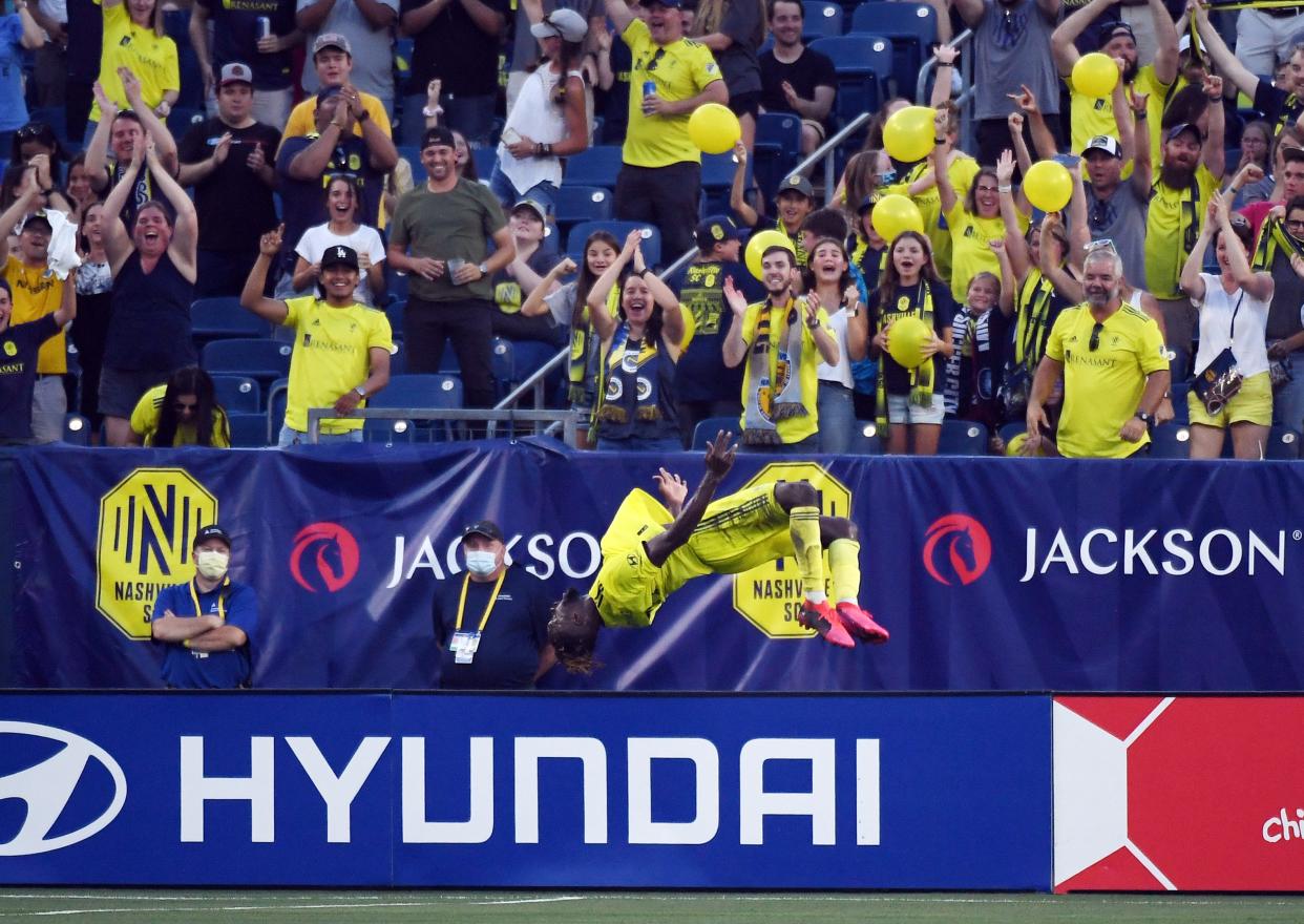 Nashville SC's C.J. Sapong celebrates after scoring a goal against FC Cincinnati at Nissan Stadium.