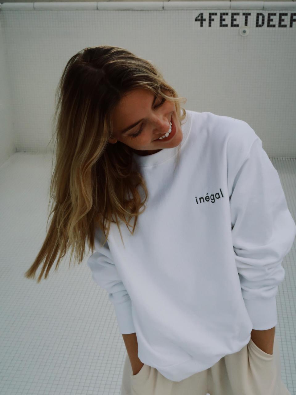 Hunt models her Inégal sweatshirt (Courtesy of Martha Hunt)