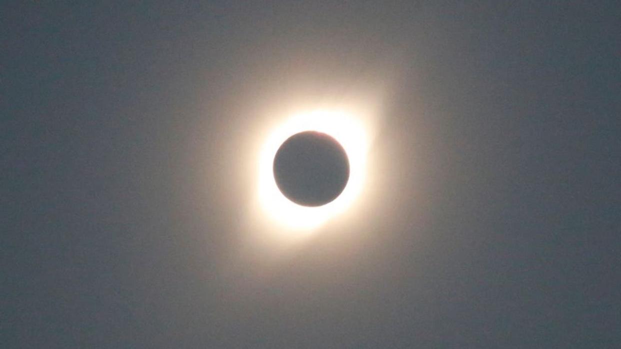 <div>LA SERENA , CHILE, JULY 02: Solar Eclipse is seen on the city La Serana, 500 km north to Santiago of Chile, Chile on July 02, 2019. Thousand of people travel to watch the astronomical phenomenum (Photo by Sebastian Brogca/Anadolu Agency/Getty Images)</div>