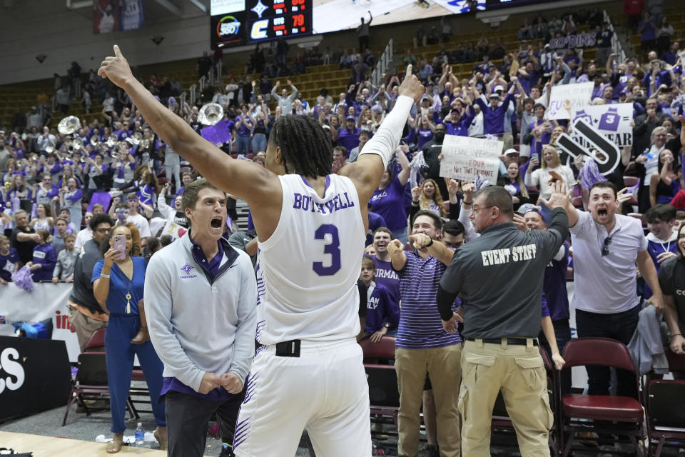 Furman guard Mike Bothwell (3) revs up fans as he celebrates after his team's win over Chattanooga in an NCAA men's college basketball championship game for the Southern Conference tournament, Monday, March 6, 2023, in Asheville, N.C. (AP Photo/Kathy Kmonicek)