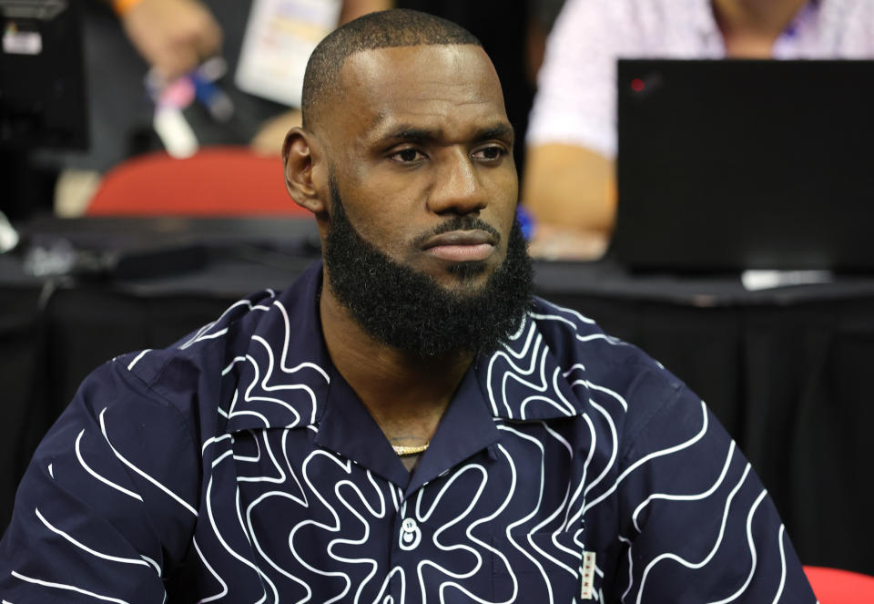 LAS VEGAS, NEVADA - JULY 08: LeBron James of the Los Angeles Lakers attends a game between the Lakers and the Phoenix Suns during the 2022 NBA Summer League at the Thomas & Mack Center on July 08, 2022 in Las Vegas, Nevada. NOTE TO USER: User expressly acknowledges and agrees that, by downloading and or using this photograph, User is consenting to the terms and conditions of the Getty Images License Agreement. (Photo by Ethan Miller/Getty Images)