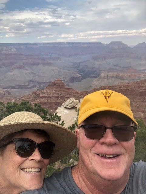 Arizona State assistant coach Mike Cavanaugh, right, and his wife, Laurie.