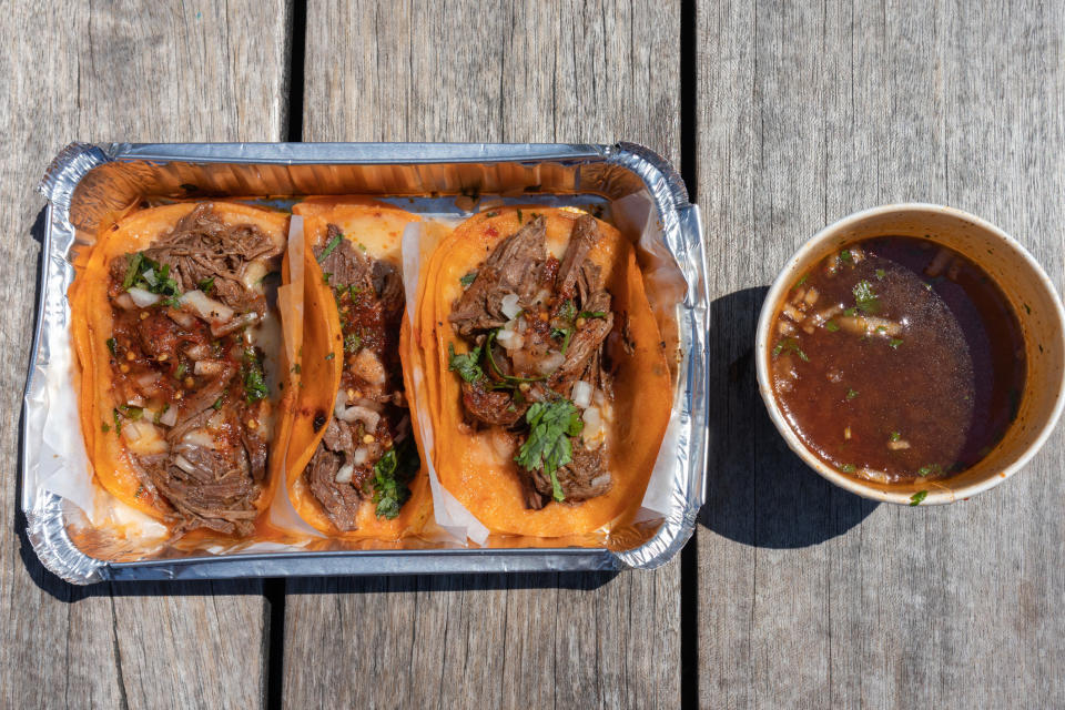 Mexican birria tacos and consomme.