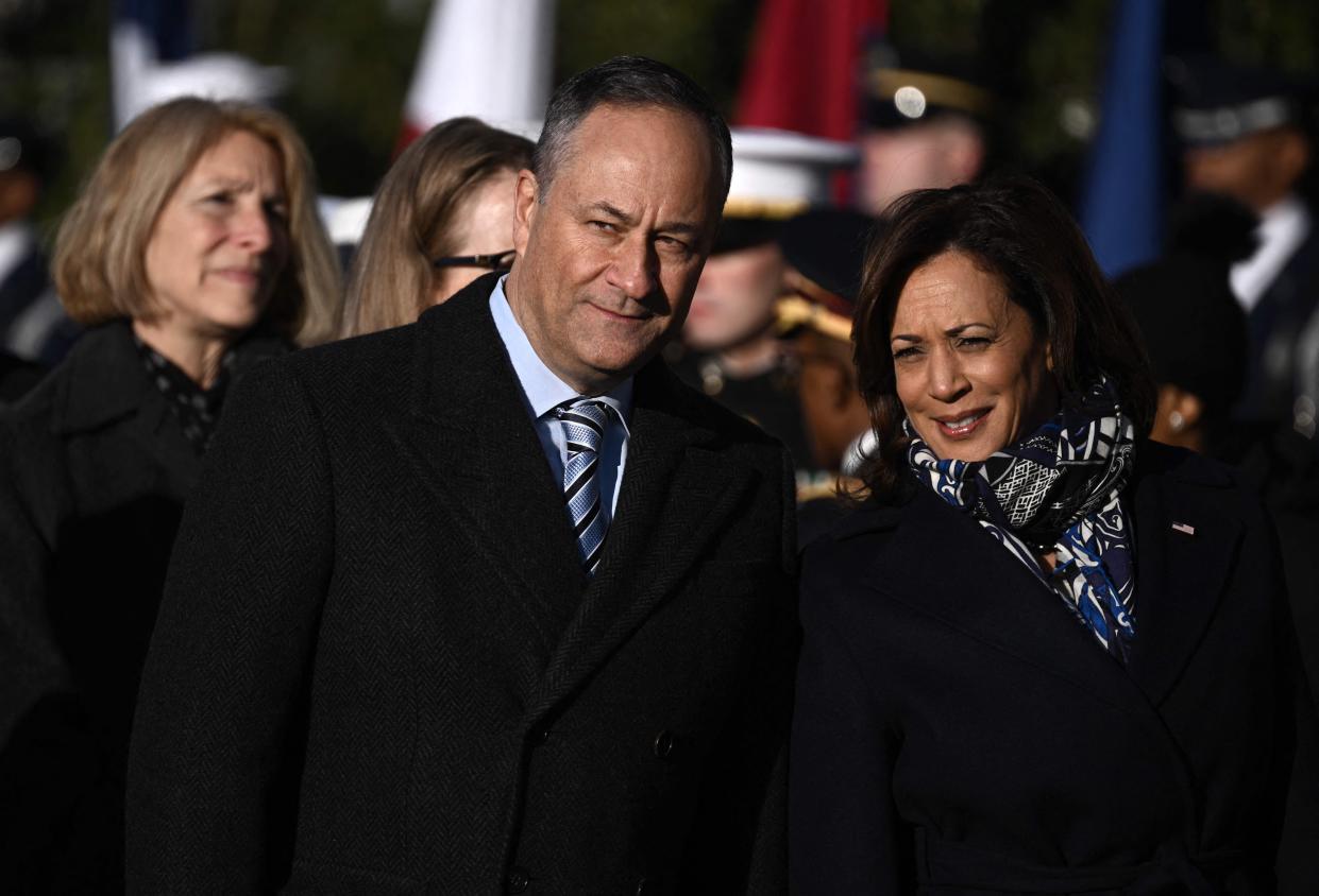 Vice President Kamala Harris and second gentleman Doug Emhoff wait for the welcoming ceremony for French President Emmanuel Macron and his wife, Brigitte Macron, at the White House in December.