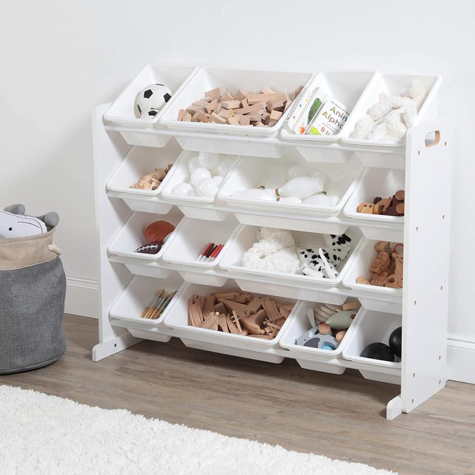 This four-shelf, 16-bin organizer will make it super easy for your kids to find the toys they're looking for &mdash; and, more importantly, they'll be able to see where to put things when they're done playing.<br /><br /><strong>Promising review:</strong> "I love it!! It was easy to put together and <strong>I'm very happy that the bins are plastic instead of cloth</strong>! It's perfect!" &mdash; <a href="https://amzn.to/3wYyLKO" target="_blank" rel="nofollow noopener noreferrer" data-skimlinks-tracking="5902331" data-vars-affiliate="Amazon" data-vars-href="https://www.amazon.com/gp/customer-reviews/R1UJ49Y583FN1D?tag=bfmal-20&amp;ascsubtag=5902331%2C5%2C37%2Cmobile_web%2C0%2C0%2C16540700" data-vars-keywords="cleaning,fast fashion" data-vars-link-id="16540700" data-vars-price="" data-vars-product-id="20969067" data-vars-product-img="" data-vars-product-title="" data-vars-retailers="Amazon">Cara</a>﻿<br /><br /><strong>Get it from Amazon for <a href="https://amzn.to/2RF2Dfh" target="_blank" rel="nofollow noopener noreferrer" data-skimlinks-tracking="5902331" data-vars-affiliate="Amazon" data-vars-asin="B07KKYXZ9W" data-vars-href="https://www.amazon.com/dp/B07KKYXZ9W?tag=bfmal-20&amp;ascsubtag=5902331%2C5%2C37%2Cmobile_web%2C0%2C0%2C16540691" data-vars-keywords="cleaning,fast fashion" data-vars-link-id="16540691" data-vars-price="" data-vars-product-id="19665215" data-vars-product-img="https://m.media-amazon.com/images/I/41T6XQLlGCL.jpg" data-vars-product-title="Humble Crew Extra-Large Toy Organizer, 16 Storage Bins, White/White" data-vars-retailers="Amazon">$59.99+</a> (available in six colors).</strong>