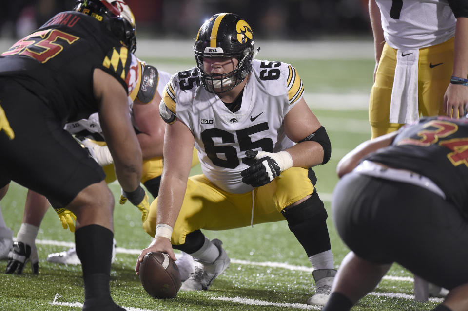 Iowa's Tyler Linderbaum would help steady the Giants' porous interior offensive line. (Photo by G Fiume/Getty Images)