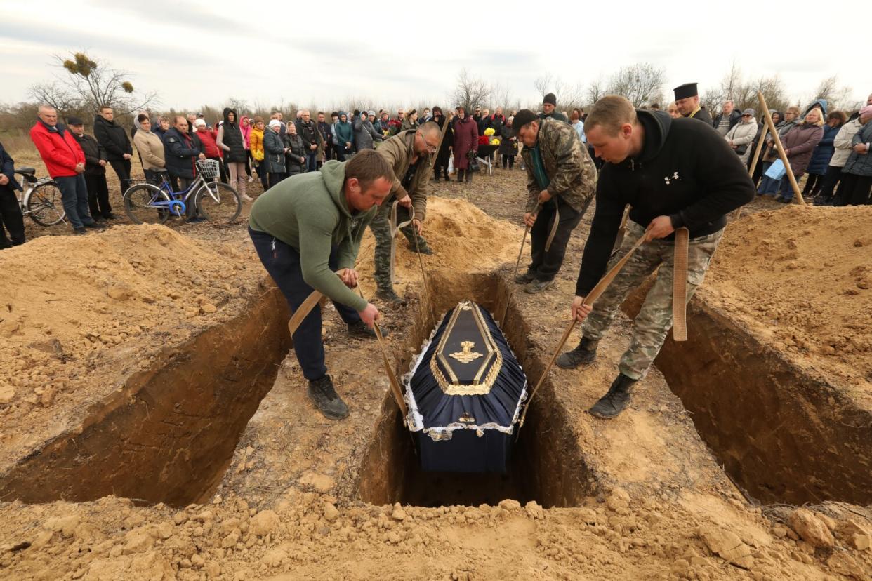 In the town of Borodyanka, people gathered for the funeral of a well-known family