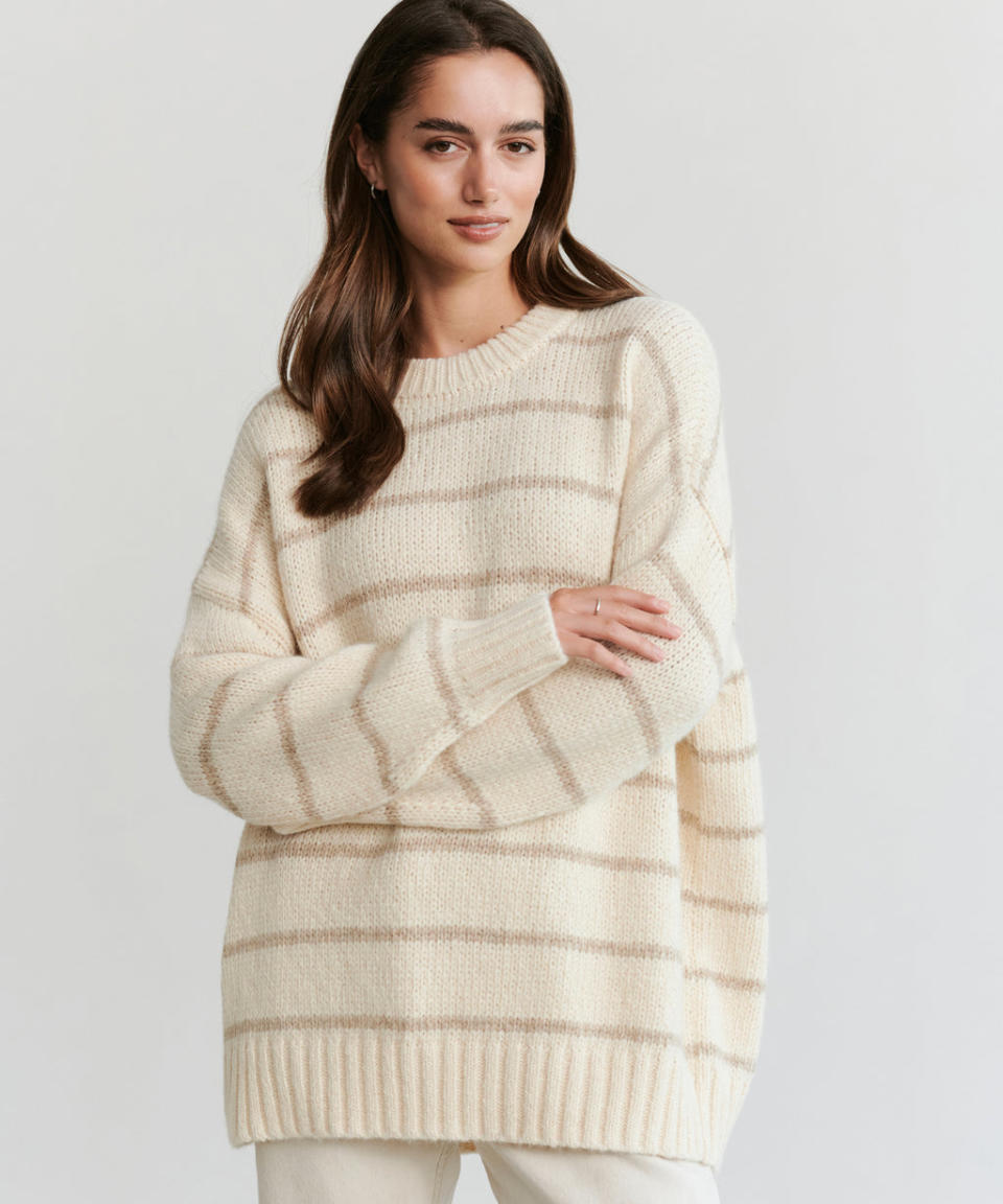 <p><a href="https://www.jennikayne.com/products/alpaca-cocoon-crewneck-ivory-stripe" rel="nofollow noopener" target="_blank" data-ylk="slk:Shop Now;elm:context_link;itc:0;sec:content-canvas" class="link ">Shop Now</a></p><p>Alpaca Cocoon Crewneck</p><p>jennikayne.com</p><p>$375.00</p><span class="copyright">jennikayne.com</span>