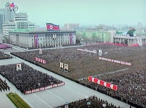 This TV grab taken off North Korea's state television shows troops and civilians at Pyongyang's Kim Il-Sung Square. Tens of thousands of North Koreans have rallied, screaming hatred for South Korean President Lee Myung-Bak and calling for his death over alleged insults during the North's anniversary celebrations