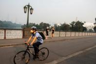 Melbourne's skyline is shrouded in toxic smoke from bushfires, disrupting the Australian Open build-up