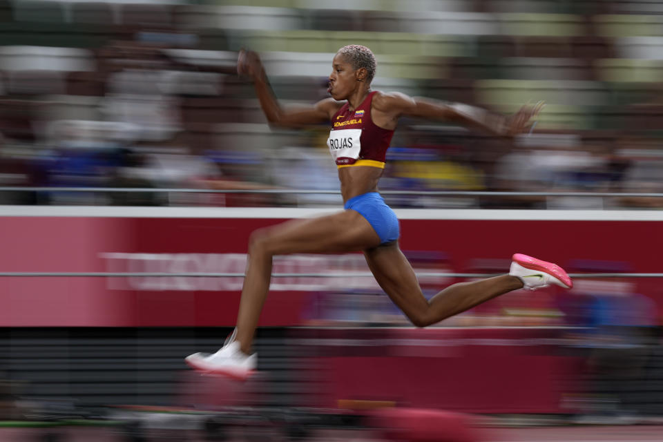 Yulimar Rojas, of Venezuela, competes in the final of the women's triple jump at the 2020 Summer Olympics, Sunday, Aug. 1, 2021, in Tokyo. (AP Photo/David J. Phillip)