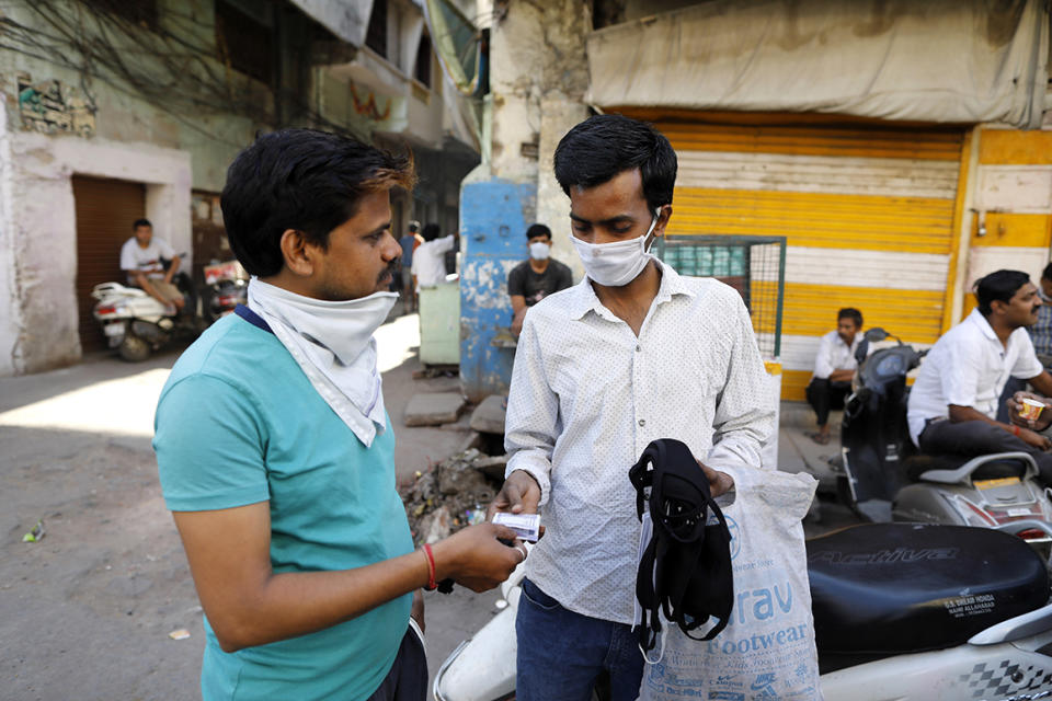 A man sells face masks during the countrywide lockdown amid concern over the spread of coronavirus in Prayagraj, India, on April 5, 2020.