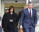 Former Baltimore mayor Catherine Pugh, left, leaves U.S. District Court in Baltimore with her attorney Steven Silverman on Thursday, Nov. 21, 2019. An 11-count federal indictment accuses Pugh of arranging fraudulent sales of her "Healthy Holly" books to schools, libraries and a medical system to enrich herself, promote her political career and fund her run for mayor. (AP Photo/Steve Ruark)