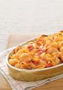 <p>Tomatoes and sour cream add extra zest in this easy and delicious dish.</p><p><strong><a href="https://www.countryliving.com/food-drinks/recipes/a2998/marilyns-mac-and-cheese-recipe/" rel="nofollow noopener" target="_blank" data-ylk="slk:Get the recipe;elm:context_link;itc:0;sec:content-canvas" class="link ">Get the recipe</a>.</strong></p>