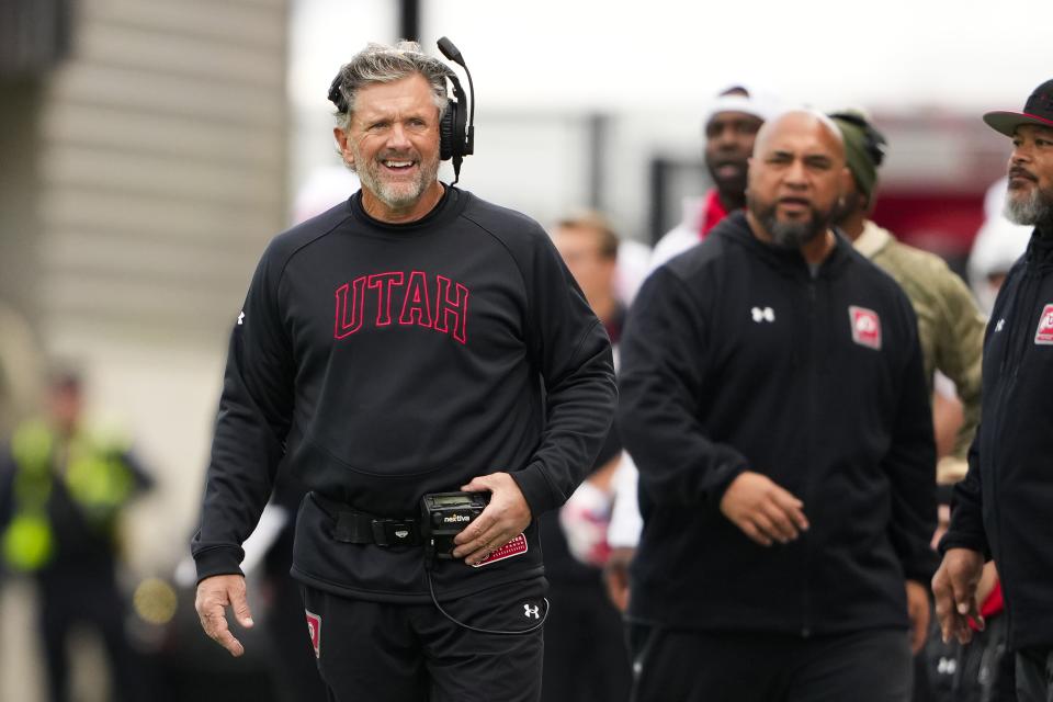 Utah head coach Kyle Whittingham, left, reacts to a pass interference call during the first half of an NCAA college football game against Washington, Saturday, Nov. 11, 2023, in Seattle. | Lindsey Wasson, Associated Press