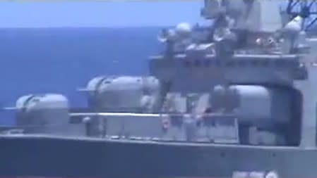 Russian naval destroyer Udaloy makes a maneuver against the USS Chancellorsville