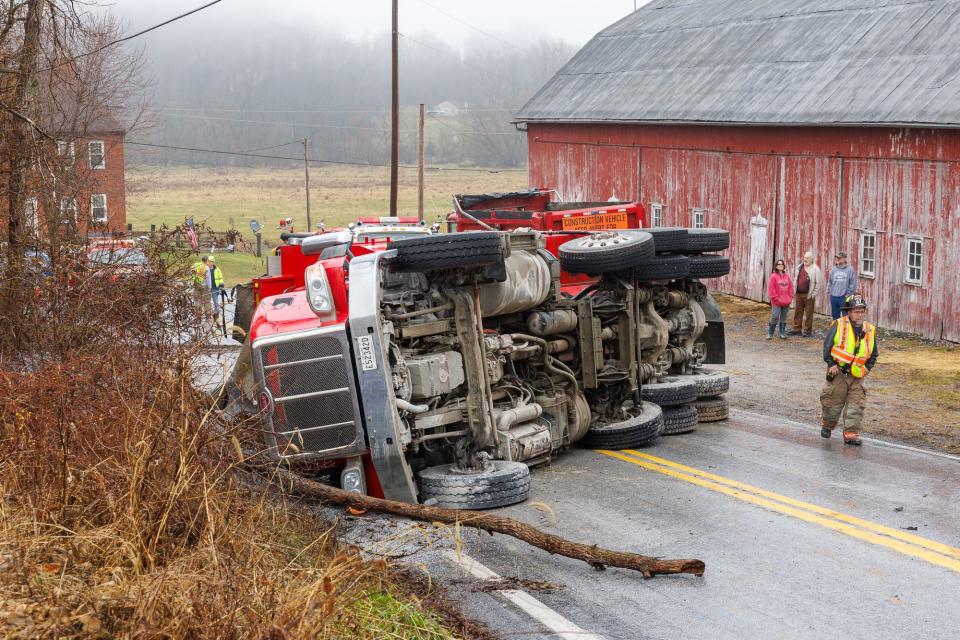 The scene where a dump truck rolled over onto its side while hauling stone on the 1600 block of Sinsheim Road, Friday, Jan. 26, 2024, in Manheim Township. The sole occupant of the truck was not injured.