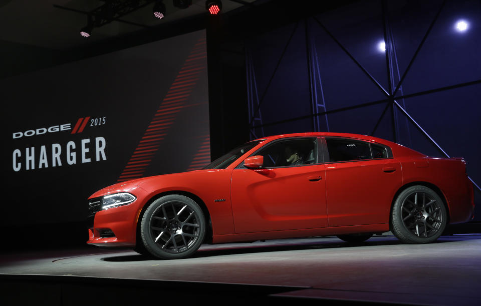 The 2015 Dodge Charger is introduced at the New York International Auto Show in New York, Thursday, April 17, 2014. (AP Photo/Seth Wenig)