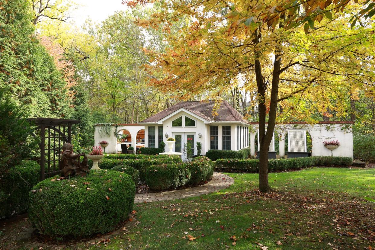 This villa's garden on the Northwest Side was inspired by famous ones found in Europe.