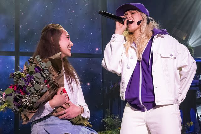 <p>Astrida Valigorsky/Getty</p> Reneé Rapp performing "One Less Lonely Girl" to Lola Tung at Brooklyn's Kings Theatre