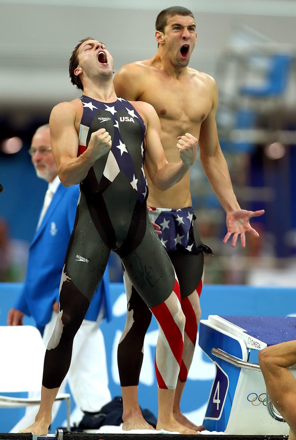 BEIJING - AUGUST 11: (L-R) Garrett Weber-Gale and Michael Phelps of the United States celebrate finishing the Men's 4 x 100m Freestyle Relay Final in first place to win the gold medal held at the National Aquatics Center on Day 3 of the Beijing 2008 Olympic Games on August 11, 2008 in Beijing, China.The United States finished the race in first place in a time of 3:08.24 and wins the gold medal and set a new World Record. (Photo by Mike Hewitt/Getty Images)