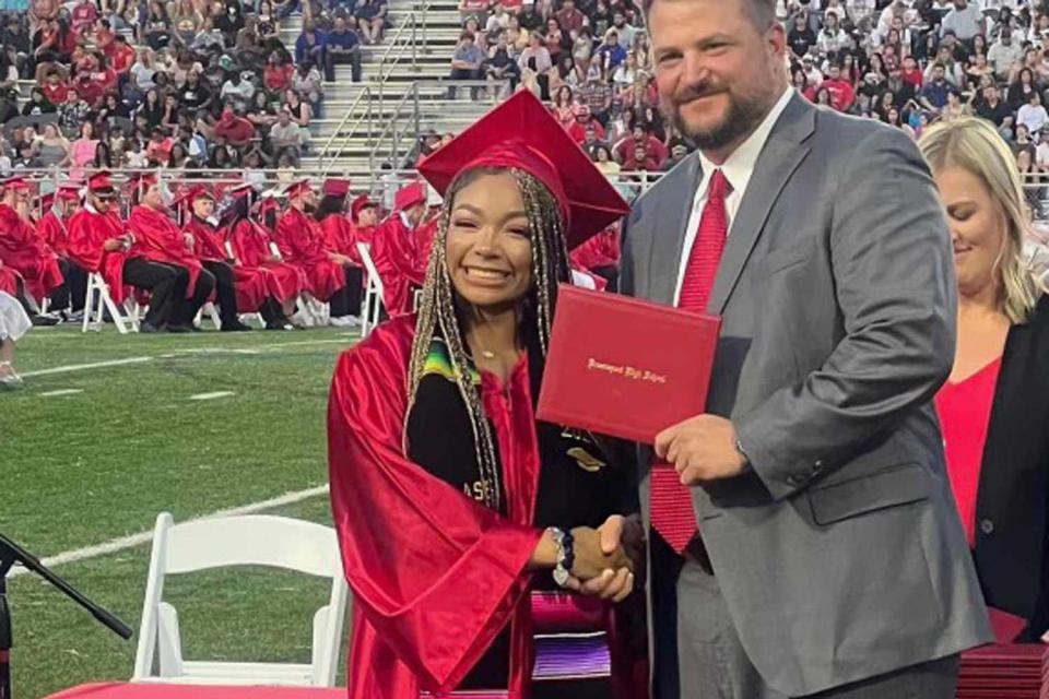 <p>Courtesy of Cynthia Vasquez</p> Kayleigh Craddock (L), a homecoming queen, wearing a Mexican heritage sash at her Brazosport High School graduation in May 2023 