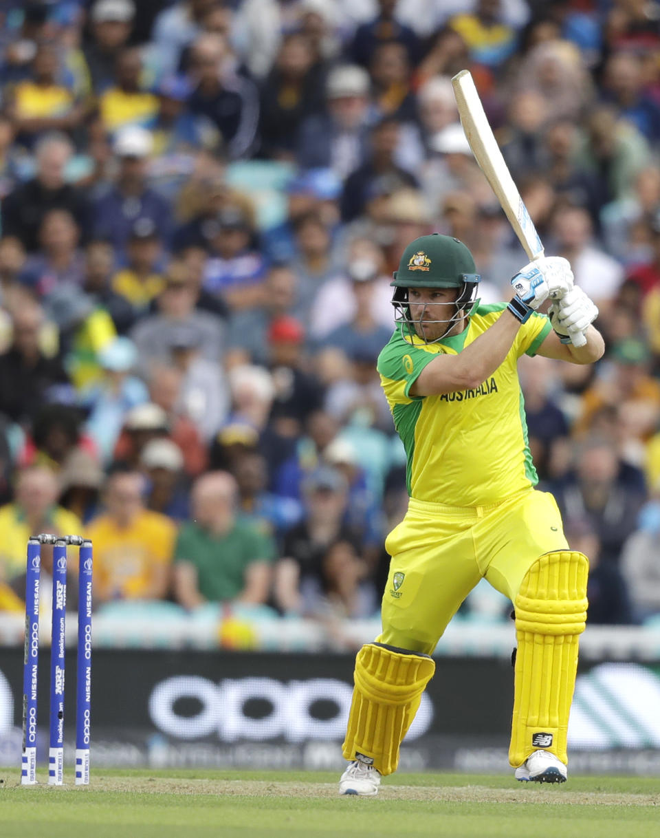 Australia's captain Aaron Finch plays a shot during the World Cup cricket match between Sri Lanka and Australia at The Oval in London, Saturday, June 15, 2019. (AP Photo/Kirsty Wigglesworth)