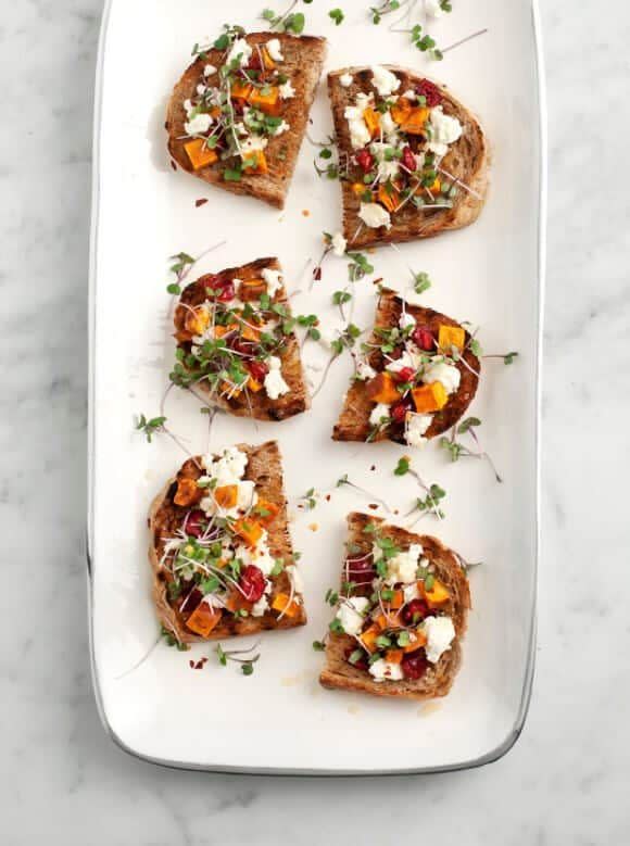 <p>A customary pairing (sage and cranberry) plus a few atypical flavors (hello, salty feta and sweet honey) make this app a must-taste.</p><p><em>Get the recipe at <a href="https://www.loveandlemons.com/sweet-potato-feta-crostini/" rel="nofollow noopener" target="_blank" data-ylk="slk:Love & Lemons;elm:context_link;itc:0;sec:content-canvas" class="link ">Love & Lemons</a>.</em></p>