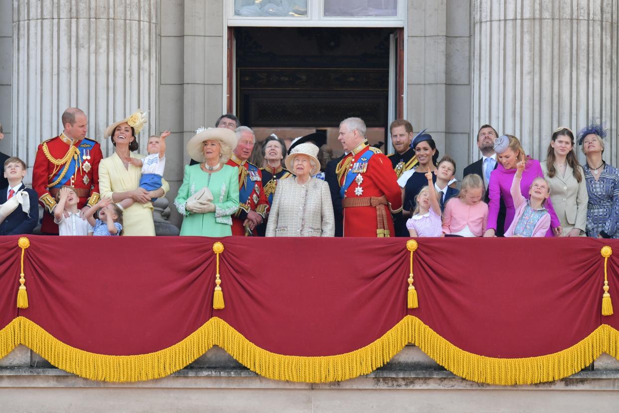Prince Harry and Meghan Markle pictured on the balcony for Trooping the Colour, standing in the back behind Prince Andrew