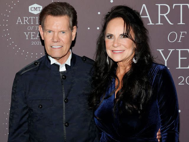 <p>Randy Travis and Mary Travis</p> Randy Travis and Mary Davis attend the 2021 CMT Artist of the Year on October 13, 2021 in Nashville, Tennessee.