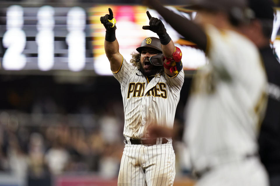 San Diego Padres' Jorge Alfaro reacts after hitting a walk off single during the eleventh inning of a baseball game against the Arizona Diamondbacks, Tuesday, June 21, 2022, in San Diego. The Padres won, 3-2. (AP Photo/Gregory Bull)