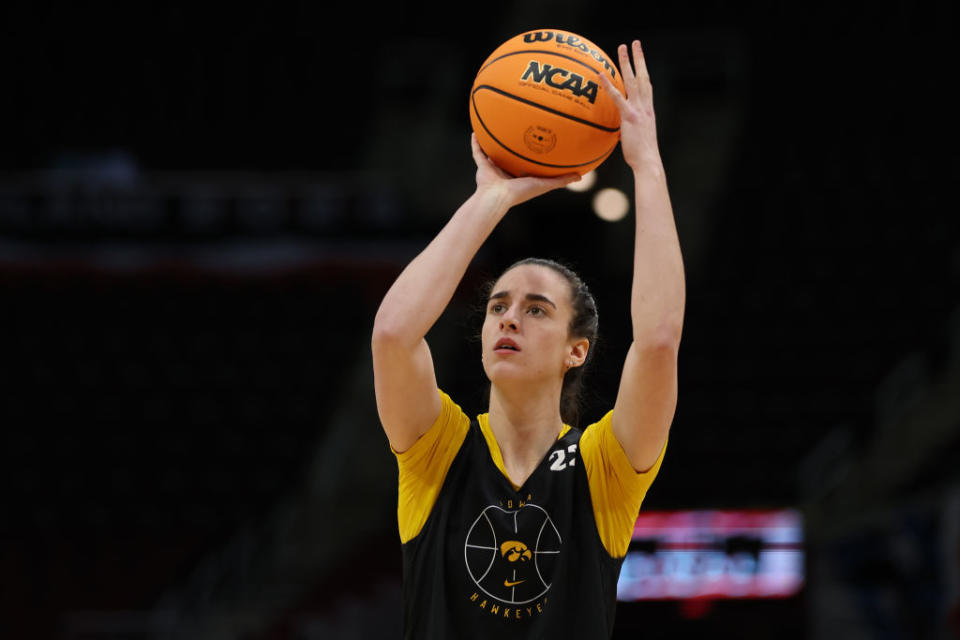 CLEVELAND, OHIO - APRIL 04: Caitlin Clark #22 of the Iowa Hawkeyes looks on during an open practice ahead of the 2024 NCAA Women's Basketball Tournament Final Four at Rocket Mortgage Fieldhouse on April 04, 2024 in Cleveland, Ohio. (Photo by Steph Chambers/Getty Images)