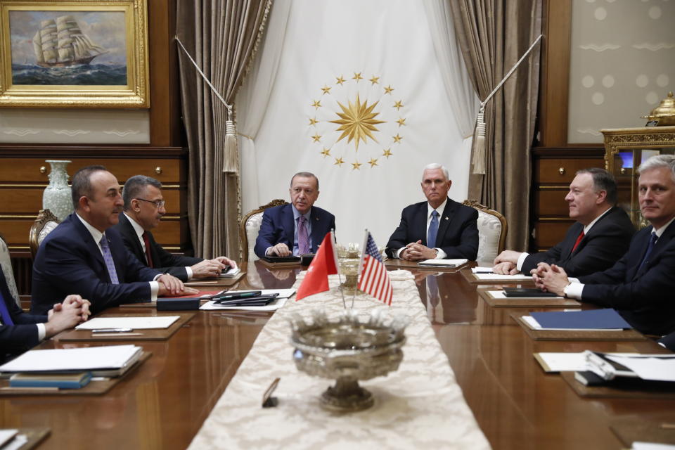 Vice President Mike Pence meets with Turkish President Recep Tayyip Erdogan at the Presidential Palace for talks on the Kurds and Syria, Thursday, Oct. 17, 2019, in Ankara, Turkey. Secretary of State Mike Pompeo and U.S. National Security Adviser Robert O'Brien, right, Turkish VP Fuat Oktay and Turkish Foreign Minister Mevlüt Çavuşoğlu, are left. (AP Photo/Jacquelyn Martin)