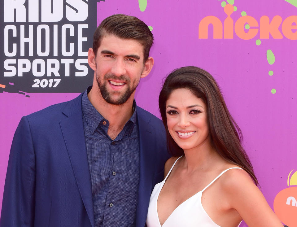 Michael Phelps and wife Nicole Phelps speak out about his mental health challenges. 