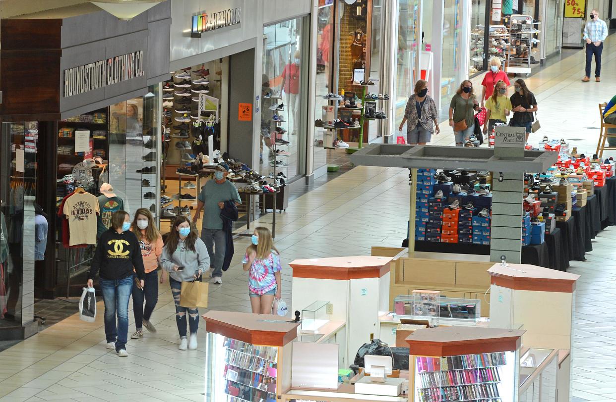 Shoppers stroll through Central Mall in Fort Smith.