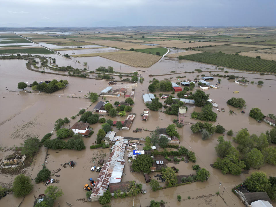 Floodwaters cover houses and farms after the country's record rainstorm in the village of Kastro, near Larissa, Thessaly region, central Greece, Thursday, Sept. 7, 2023. The death toll from severe rainstorms that lashed parts of Greece, Turkey and Bulgaria increased after rescue teams in the three neighboring countries recovered more bodies. (AP Photo/Vaggelis Kousioras)