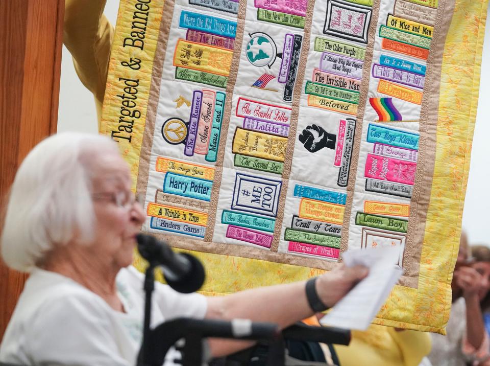 "In response to the book banning throughout our country and Martin County, I have created this quilt to remind all of us that these few of so many more more books that are banned or targeted, need to be proudly displayed and protected," said Grace Linn, 100, of Jensen Beach, while addressing the Martin County School Board during public comment, Tuesday, March 21, 2023, at 1939 SE Federal Highway in Stuart. Pulitzer Prize winner Toni Morrison and best-selling young-adult novelist Jodi Picoult are some of the writers whose works were removed from the Martin County School District's middle and high schools last month.