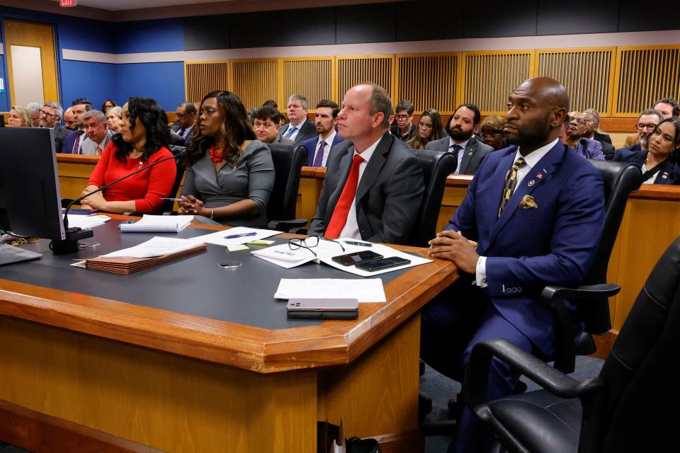 From left, Fulton County District Attorney Fani Willis, prosecutor Daysha Young, attorney Andrew Evans and Nathan Wade listen during a hearing on the Georgia election interference case on March 1 in Atlanta.
